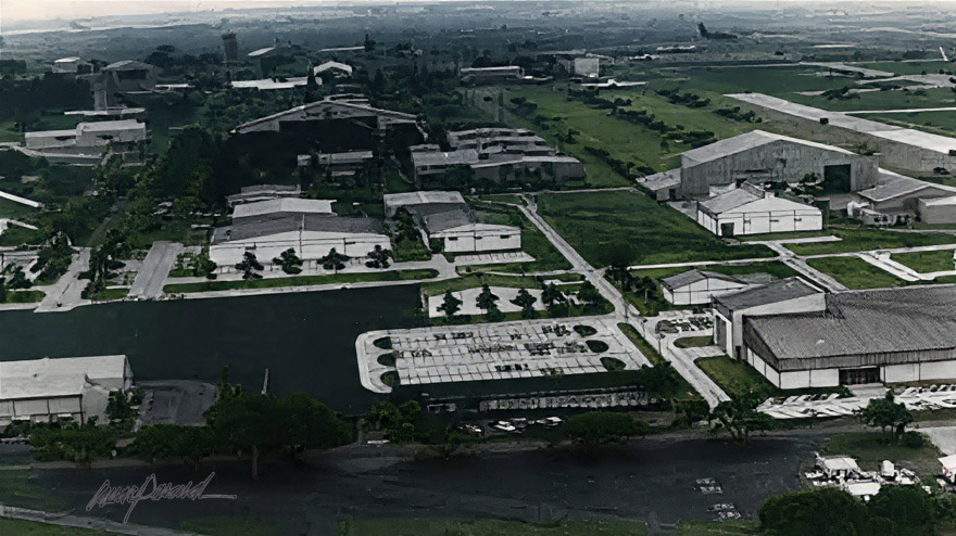 We have prepared a comprehensive package briefing for HQ, which includes hand-rendered illustrations of the proposed Airfield Hangars. These detailed architectural delineations are overlaid on an aerial photo, showcasing the design and layout effectively.